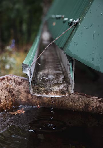 vertical-closeup-roof-drain-pipe_181624-46535